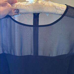 Beautiful Aidan Mattox black dress with mesh detail and mesh ruffled sleeves